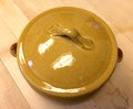 Rustic brown yellow pottery dish or cocotte with lid. Farmhouse charm