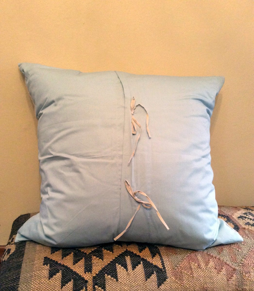 Two cool large decorative pillows in linen and blue with 2 ties closure