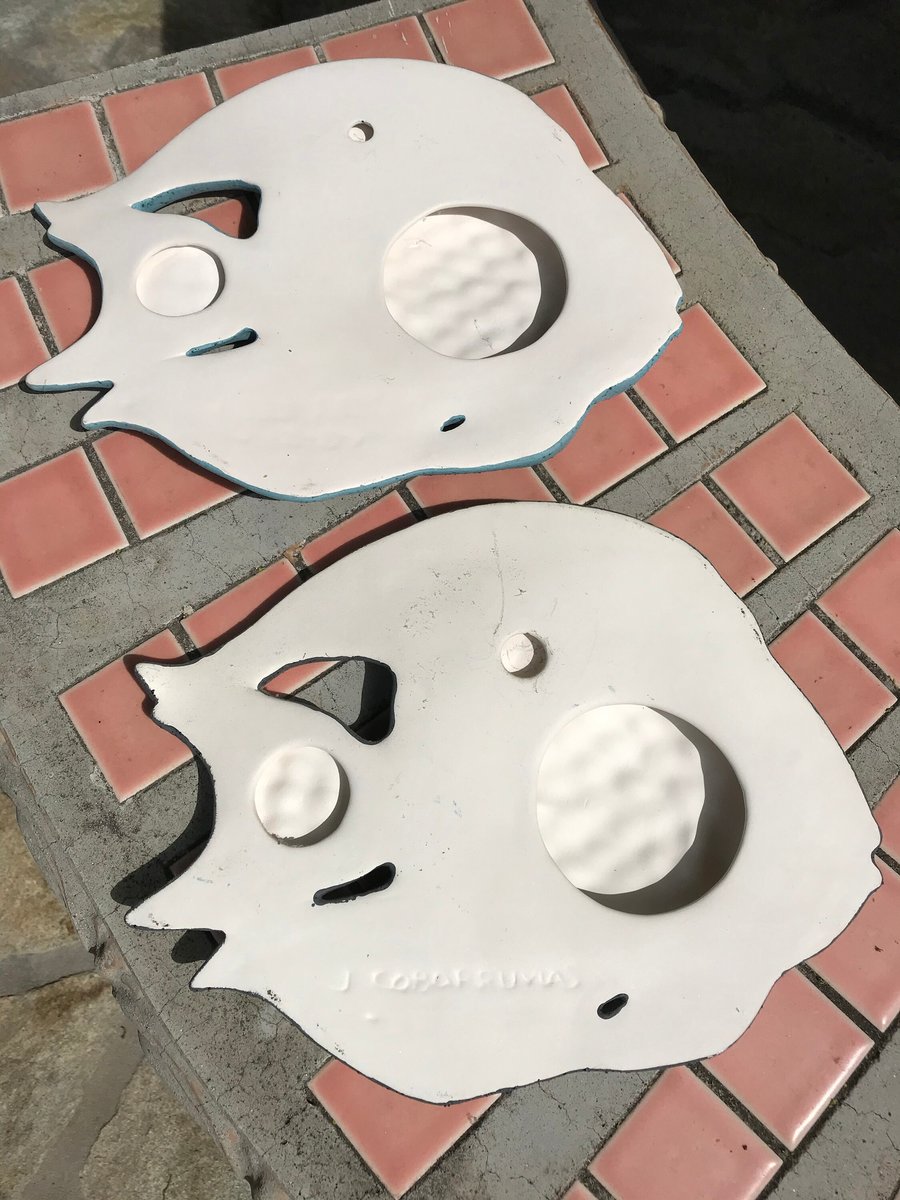 TWO CLAY FISHES, blue and gray