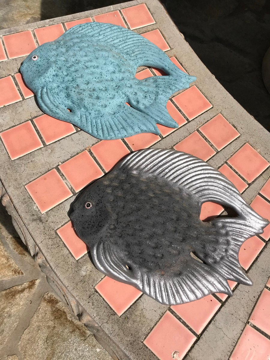 TWO CLAY FISHES, blue and gray