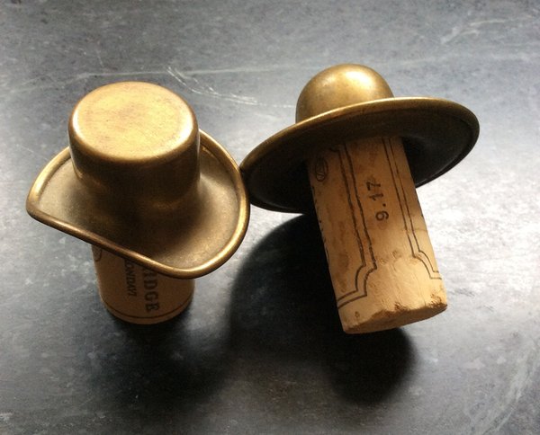 Vintage brass bottle toppers shaped as hats