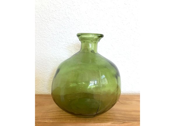 Green glass bottle vase